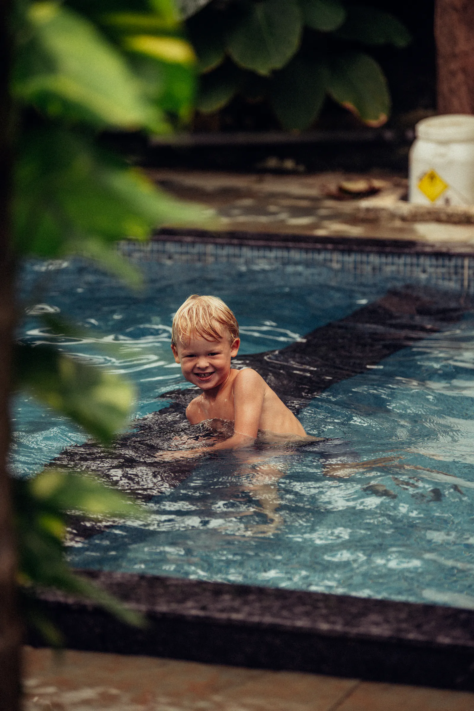 Guests sharing an afternoon by the Paddlecult pool