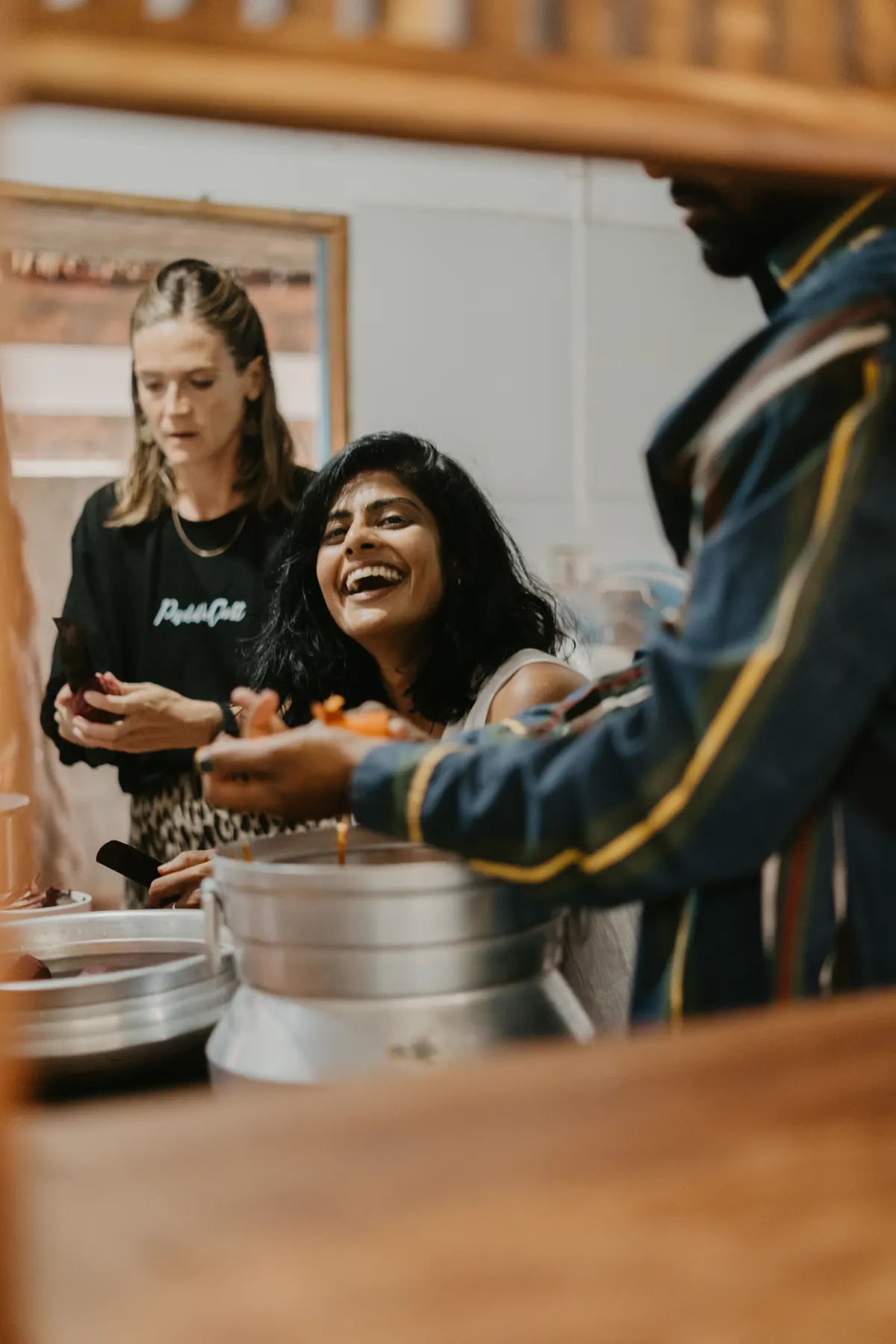 Guests sharing a meal at Paddlecult